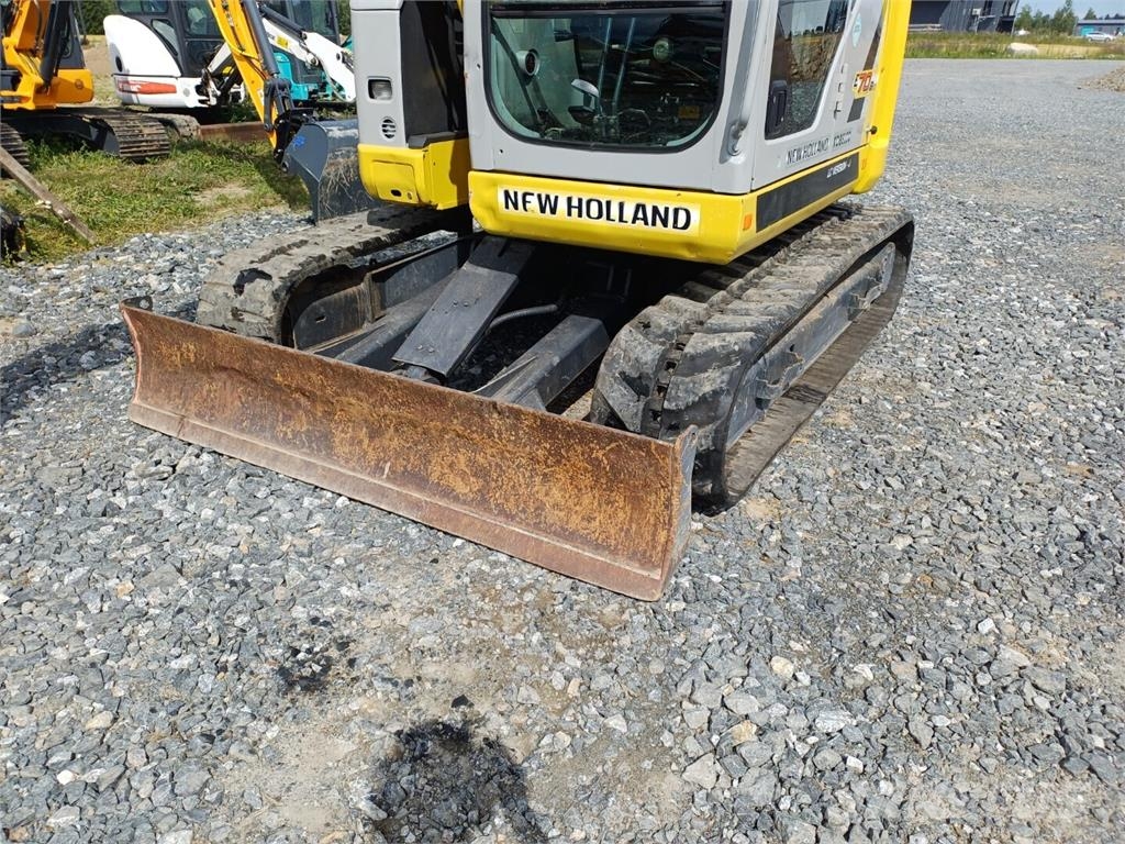 New Holland E70BSR-2 pihti engconilla Midigraafmachines 7t - 12t