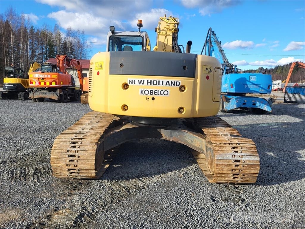New Holland Kobelco E 235 SR حفارات زحافة