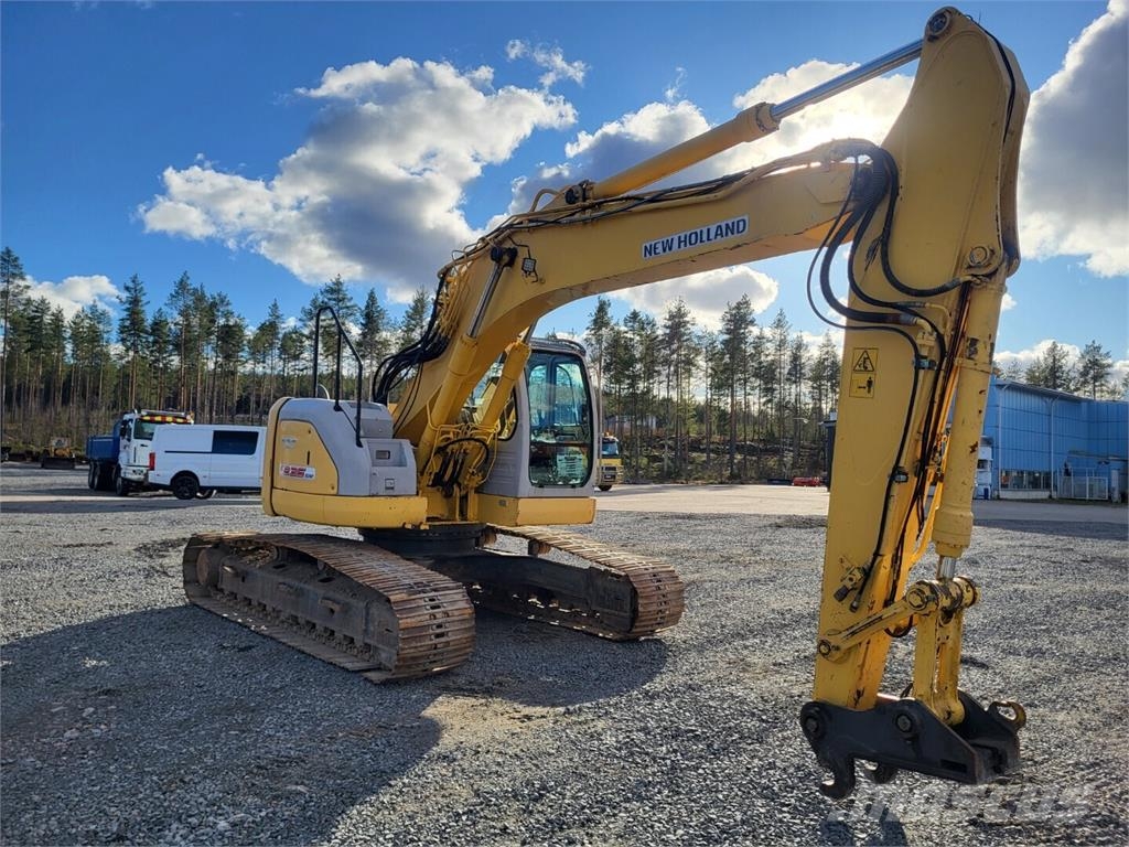New Holland Kobelco E 235 SR حفارات زحافة