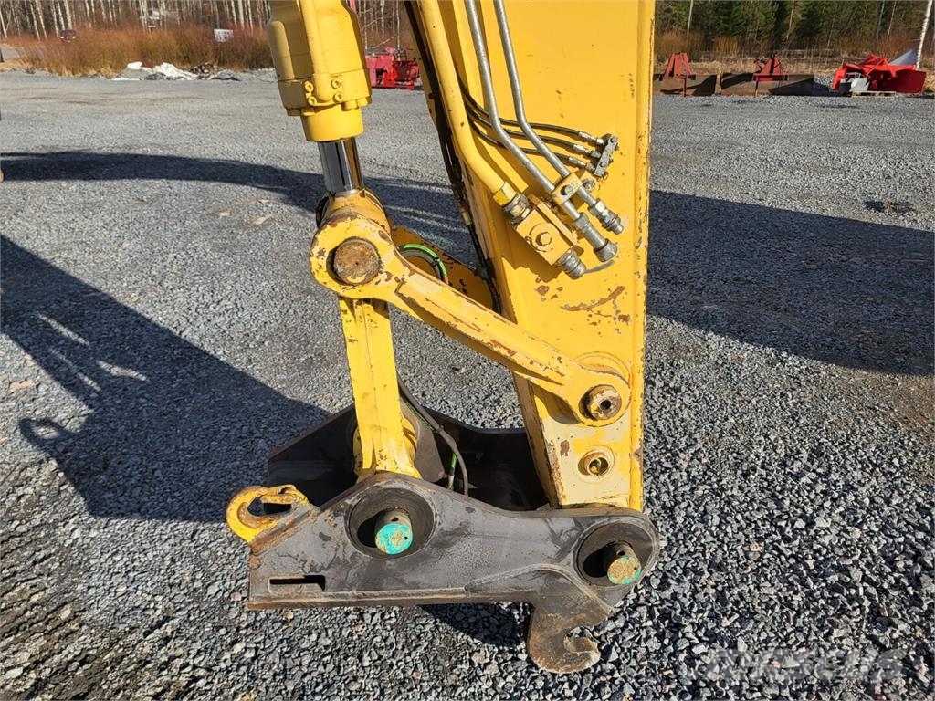 New Holland Kobelco E 235 SR حفارات زحافة