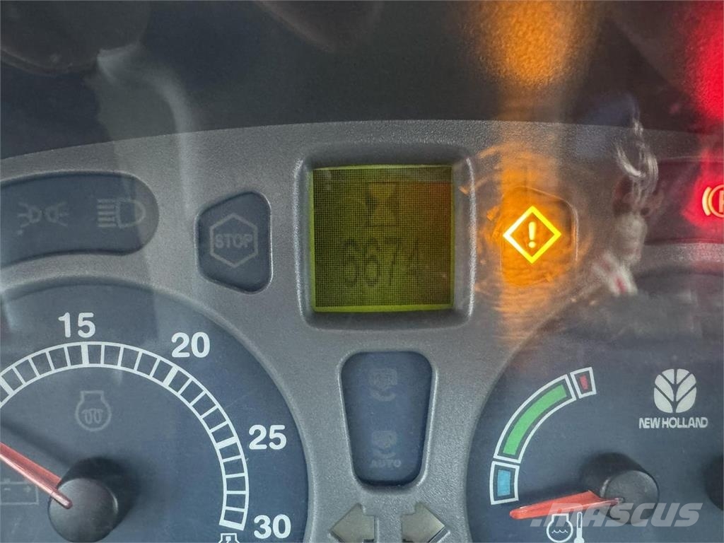 New Holland TL100A DC + Etukuorm. Traktoriai