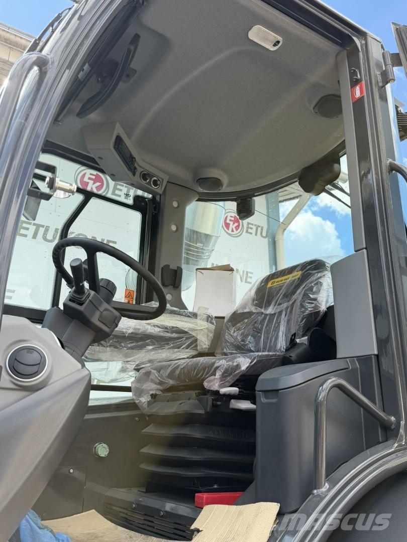 New Holland W100D Pyöräkuormaaja Фронтальні навантажувачі