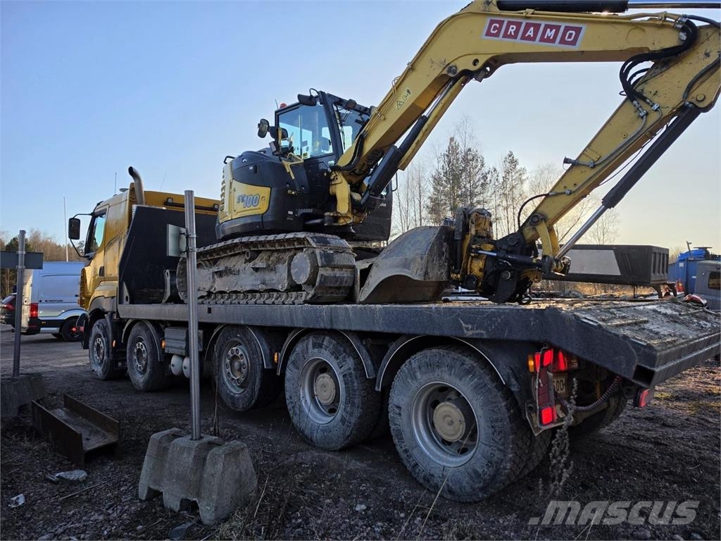 Sisu E13 500 10X4 Kaivinkoneritilä Camiones de transporte de maquinaria forestal