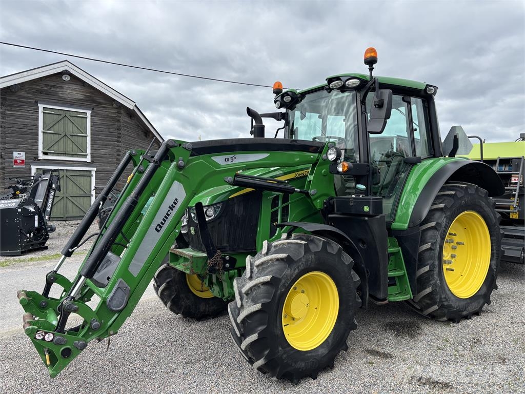 John Deere 6090M med Ålö Q5s-Lastare Tractoren