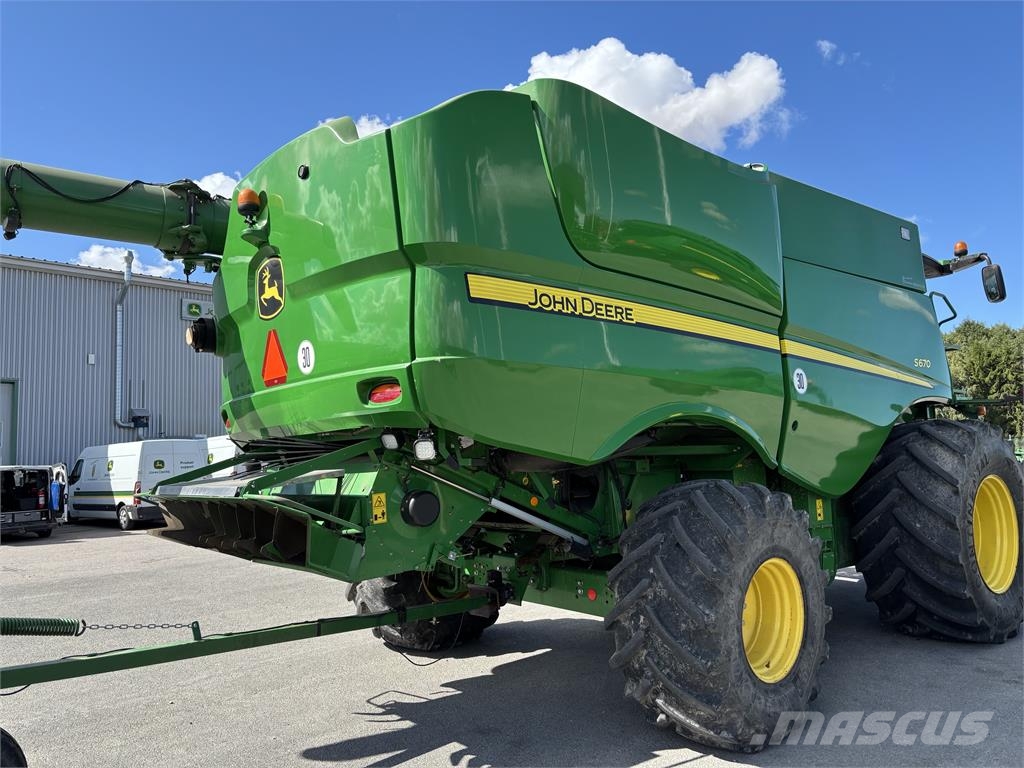 John Deere S670 SKÖRDETRÖSKA 25 FOT Cosechadoras combinadas