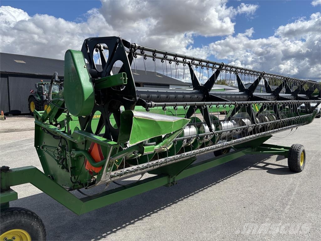 John Deere S670 SKÖRDETRÖSKA 25 FOT Cosechadoras combinadas