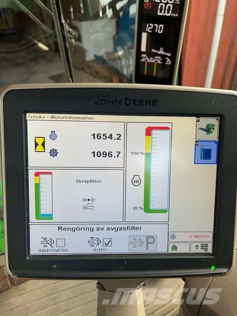John Deere S670 SKÖRDETRÖSKA 30 FOT Mietitrebbiatrici