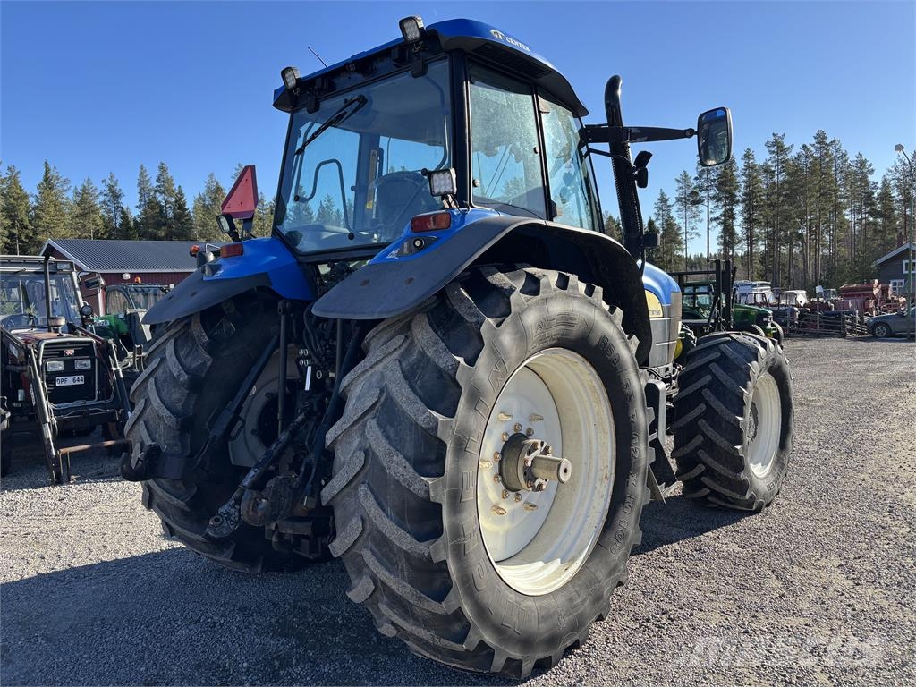 New Holland TM 190 med frontlyft PTO Traktoren