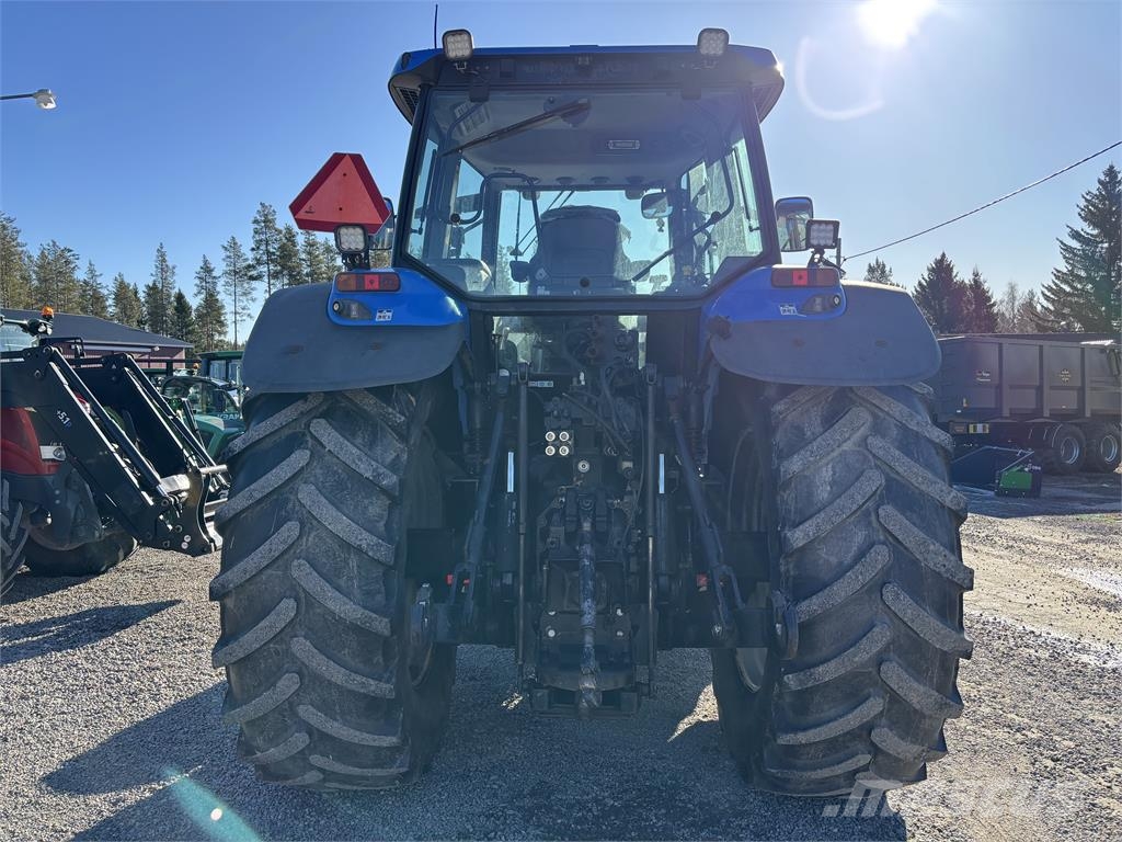 New Holland TM 190 med frontlyft PTO Traktoren