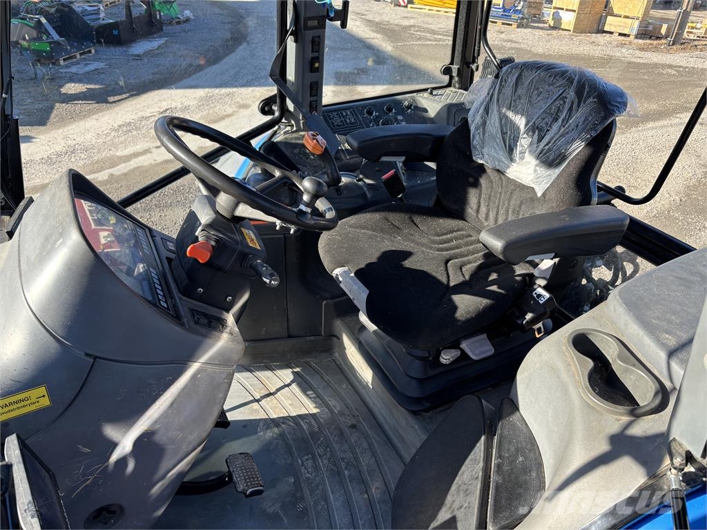 New Holland TM 190 med frontlyft PTO Traktoren