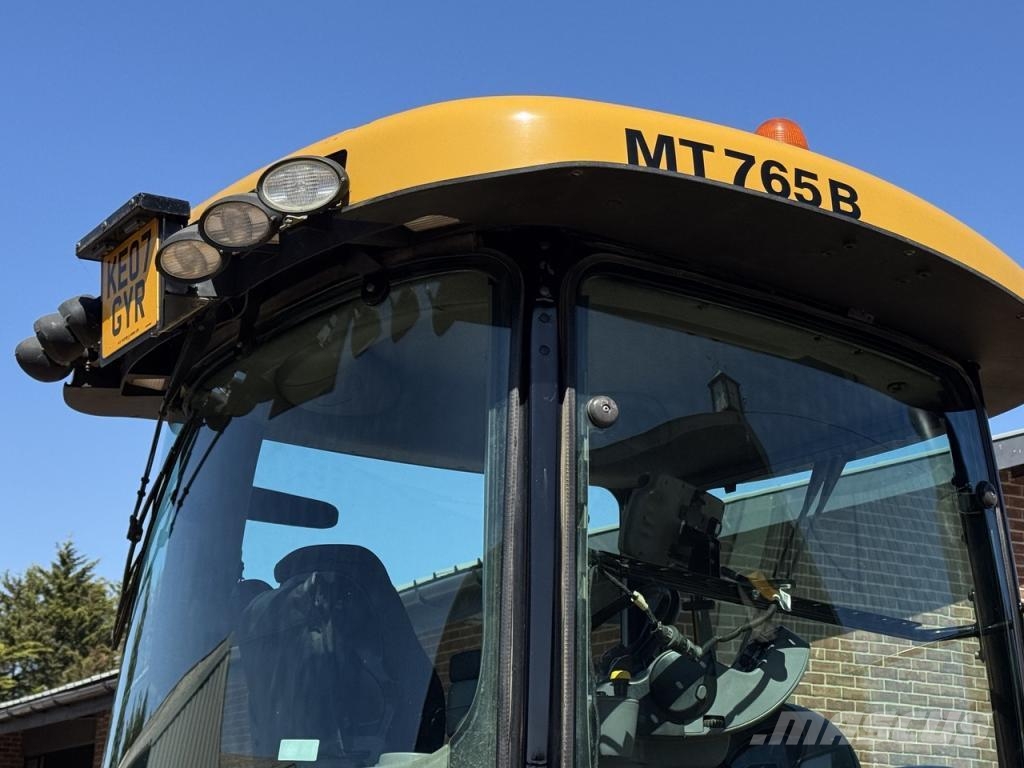 CAT 765B Challenger Další