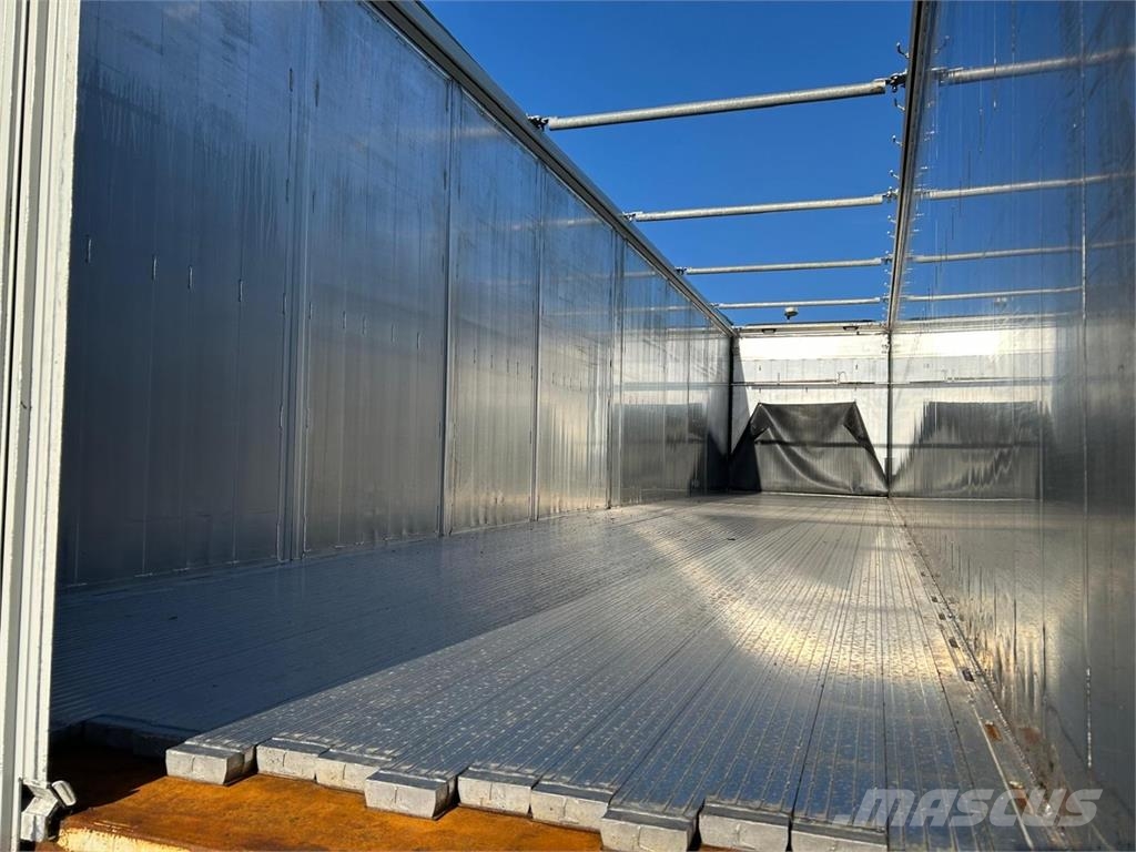 Legras 4-aks 91m3 med sideåbning. أنصاف المقطورات ذات سطح متحرك
