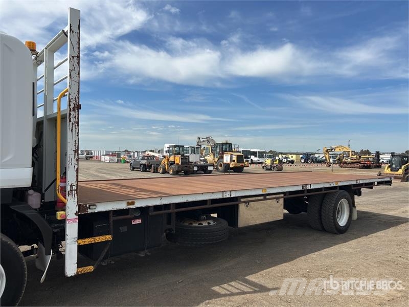 Isuzu FTR 900 4x2 Flatbed Truck شاحنات مسطحة/مفصلية الجوانب