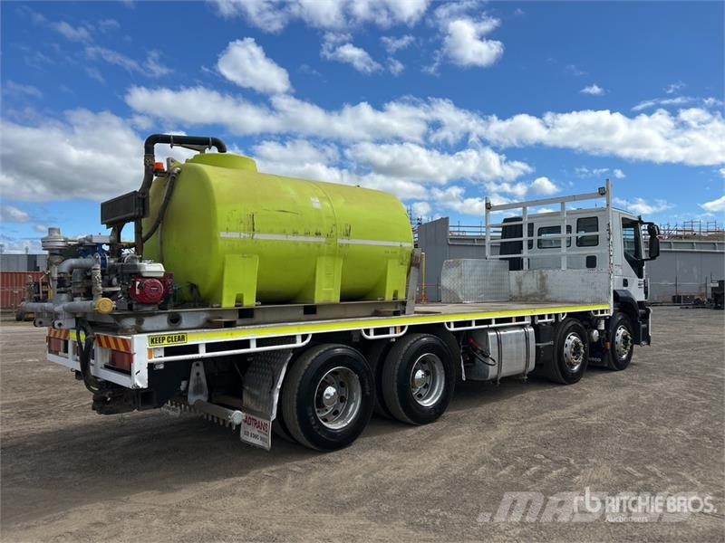 Iveco Stralis AT 500 8x4 Twin-Steer Flatbed Truck شاحنات مسطحة/مفصلية الجوانب