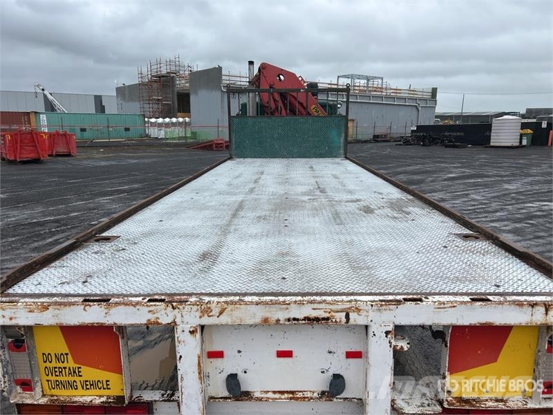 Kenworth L700 6x4 w/Palfinger PK12000 A 4.48 t Knuckle Boom Vlakke laadvloer met kraan