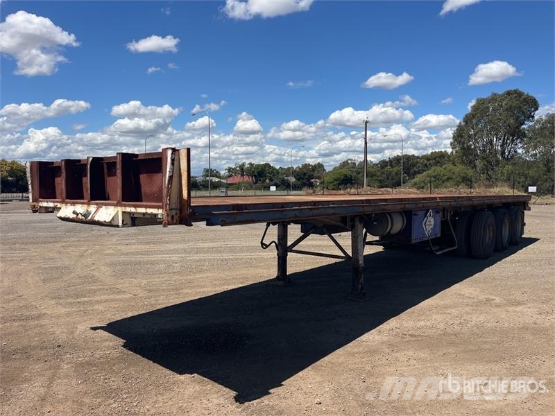  Krueger 12.2 m Tri/A Flatbed Trailer مقطوروات مسطحة/مفصلية الجوانب