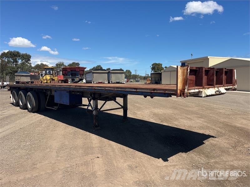  Krueger 12.2 m Tri/A Flatbed Trailer مقطوروات مسطحة/مفصلية الجوانب