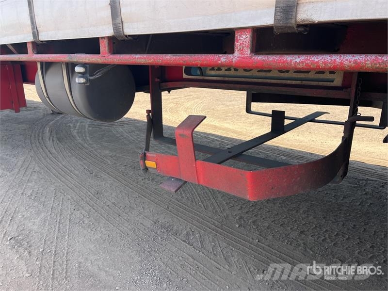Kruger 13.3 m Tri/A Step Deck Curtain Side Trailer Tenthaagised