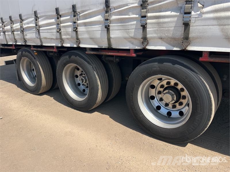Kruger 13.3 m Tri/A Step Deck Curtain Side Trailer Tenthaagised