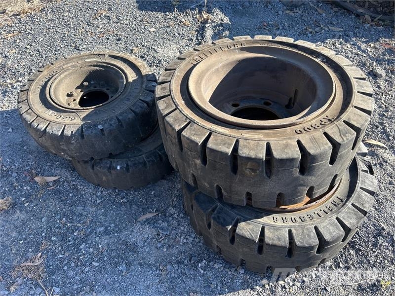 Quantity (2) 250/70-15. (2) - 6.50-10 Solid Forkl Tyres, wheels and rims