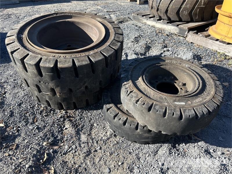 Quantity (2) 250/70-15. (2) - 6.50-10 Solid Forkl Tyres, wheels and rims