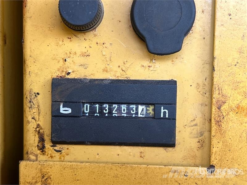 CAT M318C Ekskavatori uz riteņiem