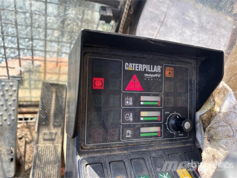 CAT M318C Ekskavatori uz riteņiem
