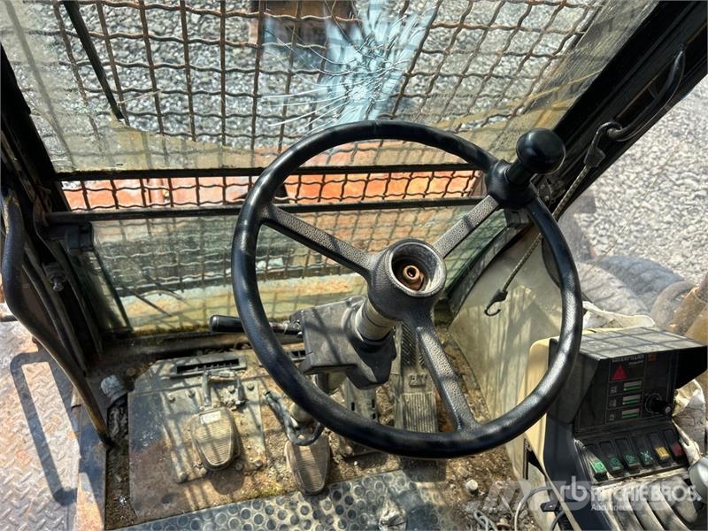 CAT M318C Ekskavatori uz riteņiem