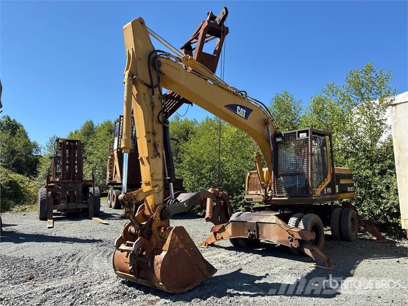 CAT M318C Ekskavatori uz riteņiem