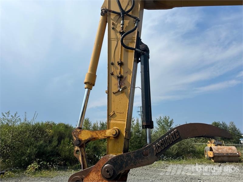 CAT M318C Ekskavatori uz riteņiem