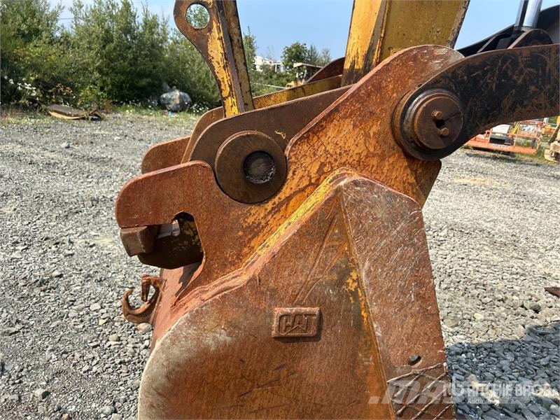 CAT M318C Ekskavatori uz riteņiem