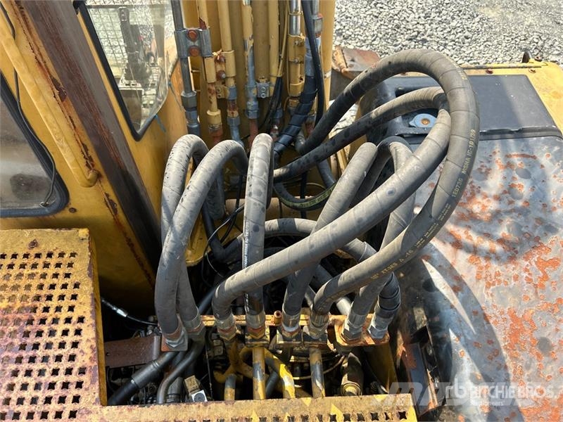 CAT M318C Ekskavatori uz riteņiem