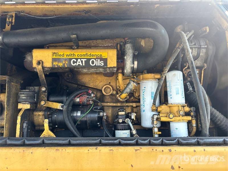 CAT M318C Ekskavatori uz riteņiem
