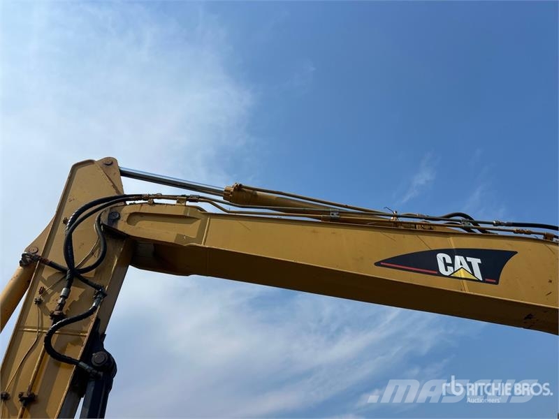 CAT M318C Ekskavatori uz riteņiem