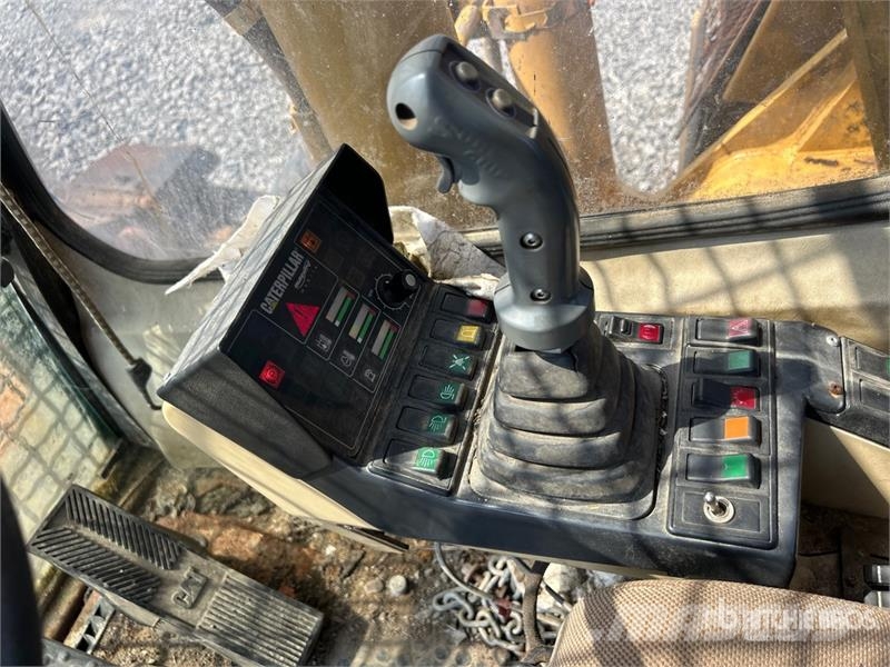 CAT M318C Ekskavatori uz riteņiem