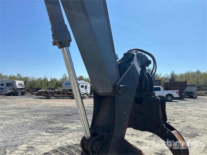 John Deere 370 Heel Boom Log Loader Lesní nakladače