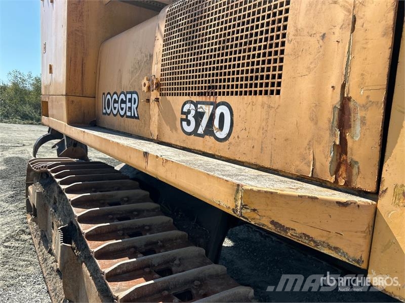 John Deere 370 Heel Boom Log Loader Lesní nakladače