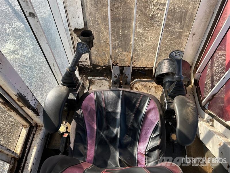 Madill 1800 Gelenkausleger Lader