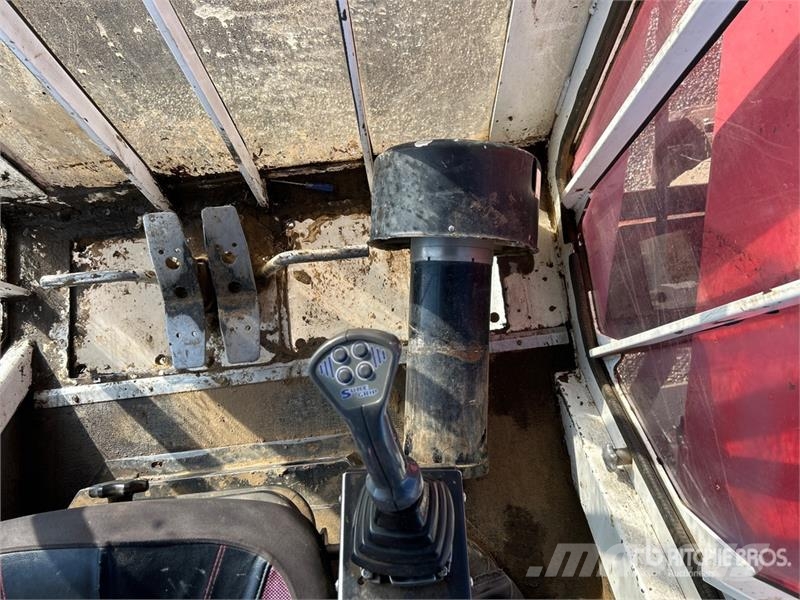 Madill 1800 Gelenkausleger Lader