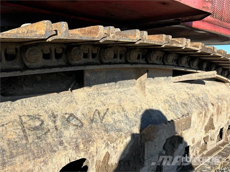 Madill 1800 Gelenkausleger Lader