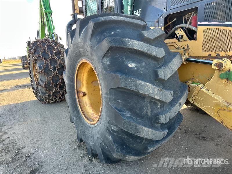 CAT 545 4x4 Line Skidder Šķeldotāji