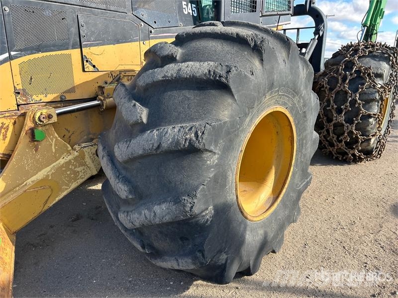 CAT 545 4x4 Line Skidder Šķeldotāji