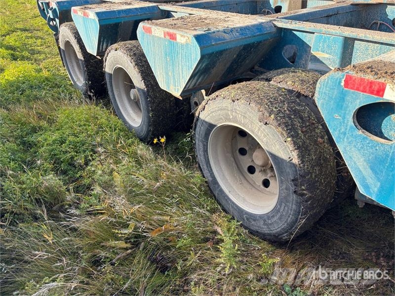 Doepker 67 ft 24-Wheel Folding Neck Trailer Низкорамные прицепы