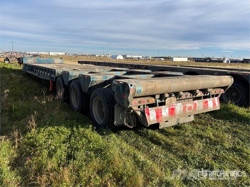Doepker 67 ft 24-Wheel Folding Neck Trailer Низкорамные прицепы