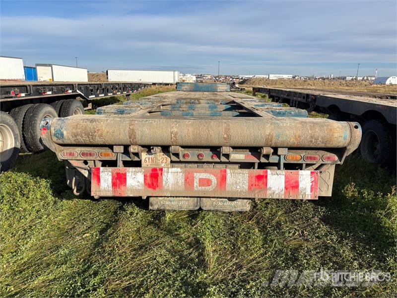 Doepker 67 ft 24-Wheel Folding Neck Trailer Низкорамные прицепы