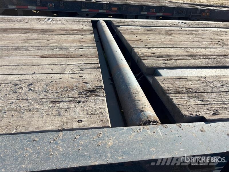 Doepker 67 ft 24-Wheel Folding Neck Trailer Низкорамные прицепы