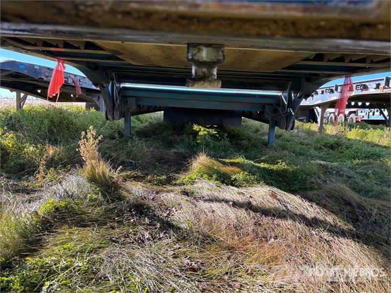 Doepker 67 ft 24-Wheel Folding Neck Trailer Низкорамные прицепы