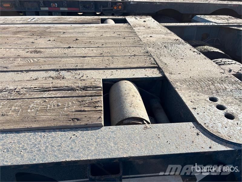 Doepker 67 ft 24-Wheel Folding Neck Trailer Низкорамные прицепы
