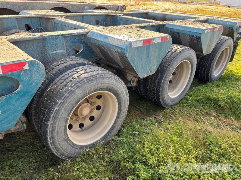 Doepker 67 ft 24-Wheel Folding Neck Trailer Низкорамные прицепы