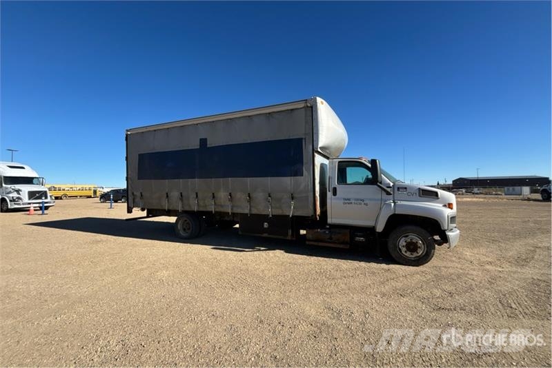 GMC C6500 4x2 Curtain Side Truck Тентовані вантажівки